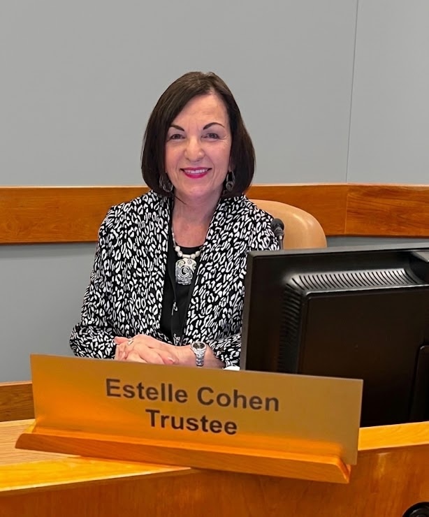 Estelle at desk